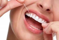 How Does Flossing Help Your Teeth?