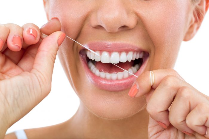 Should You Floss Before or After Brushing?