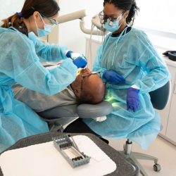 What role does patient experience play in dental clinic branding?
