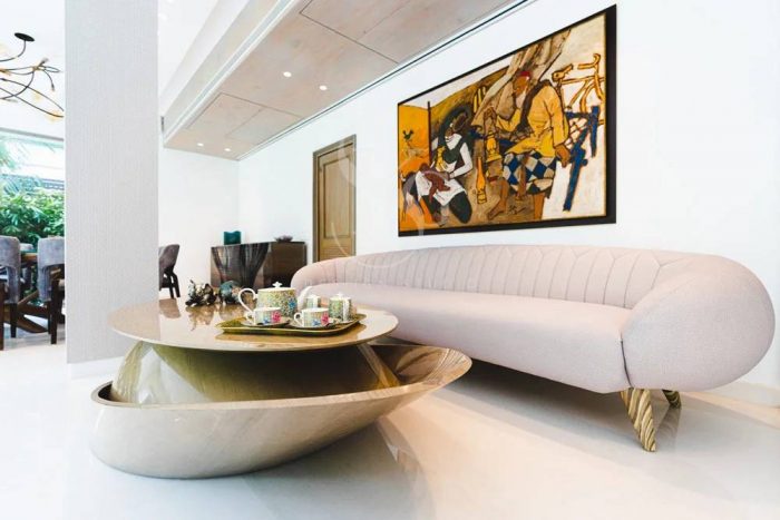 How do luxury interior designers in Delhi address sustainability and eco-friendliness in their p ...