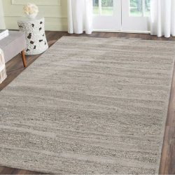 How do I deal with a new rug that won’t lie flat?