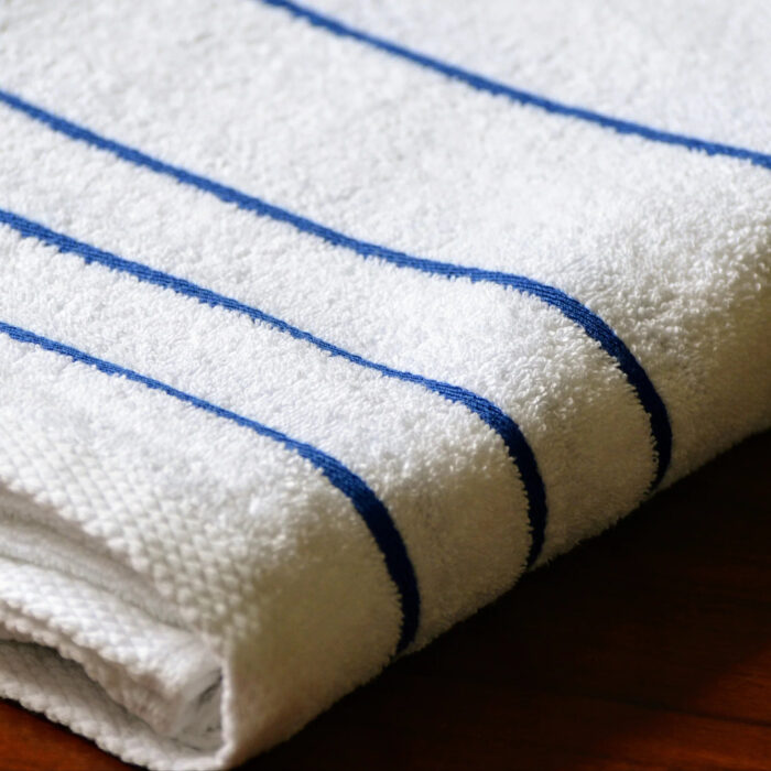 White Pool Towel with Royal Blue Stripes – Premium Hotel & Resort Pool Towel